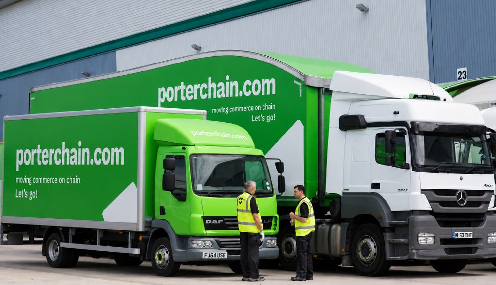 Porterchain box truck and trailer at a warehouse — moving commerce on chain
